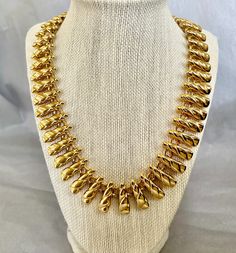 "Beautiful Gold Vintage Anne Klein Choker Necklace - signed with ANNE KLEIN hangtag. The 1\" spiral gold links form a regal collar around your neck.  Adjustable Length 18\" -20\"  Toggle Clasp This Runway Statement necklace is timeless." Formal Spiral Gold Jewelry, Egyptian Necklace, Necklace Chunky, Choker Collar, Toggle Clasp, Link Necklace, Anne Klein, Etsy Vintage, Gold Metal