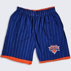 New York Knicks Vintage 90s Starter Pinstripe Basketball Shorts  NBA Basketball  Royal Blue & Orange Has Pockets No Drawstring In Excellent Vintage Condition No Holes Or Stains Men's Size : Medium ( M ) Please Double Check the Measurements Measurements: Waist: 26 in Total Length: 19 in Inseam: 8 in FREE AND FAST SHIPPING IN THE USA Summer Throwback Style Short Bottoms, Summer Streetwear Bottoms With Contrast Stripes, Summer Cotton Bottoms With Three Stripes, Casual Blue Shorts With Vertical Stripes, Orange Hats, New York Knicks, Basketball Shorts, Nba Basketball, Blue Orange