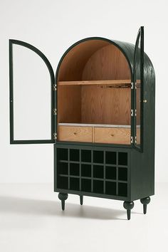 a black cabinet with wooden doors and drawers