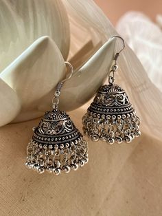 Present Beautiful Silver Earrings with Unique Design Traditional Indian Jhumkas Silver Jhumka Earrings Onam Earrings, Desi Earrings Aesthetic, Oxidised Jewellery Photography, Jhumka Earrings Aesthetic, Silver Jhumkas Indian, Jhumka Aesthetic