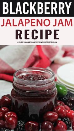 blackberry jalapeno jam recipe in a jar surrounded by berries