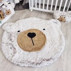 a teddy bear rug on the floor in a child's room