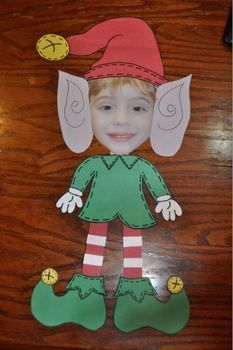 a paper cut out of a child's face with an elf hat and green pants