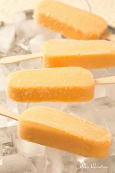 easy mango popsicles on ice with text overlay