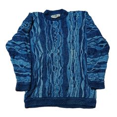 Vintage 90s Coogi Blues Australia Crewneck Sweater - Iconic Retro Knitwear Step back into the vibrant 90s with this authentic vintage Coogi Blues Australia crewneck sweater! Known for their intricate, bold designs and luxurious feel, Coogi sweaters are timeless pieces that add a unique flair to any wardrobe. This sweater, with its signature Coogi Blues pattern, is a rare find and a must-have for any vintage fashion enthusiast. Features: Era: 1990s Brand: Coogi Blues Australia Material: 100% Cott Retro Blue Long Sleeve Sweater, Blue Long Sleeve Retro Sweater, Blue Retro Winter Sweatshirt, Retro Blue Winter Top, Retro Blue Crew Neck Sweater, Blue Retro Crew Neck Sweater, 90s Fitted Crew Neck Sweater, Fitted Crew Neck Sweater 90s Style, Fitted 90s Crew Neck Sweater