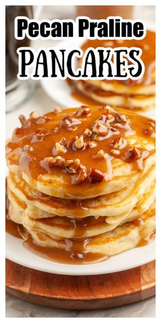 pancakes topped with pecan pralie and caramel syrup on a white plate