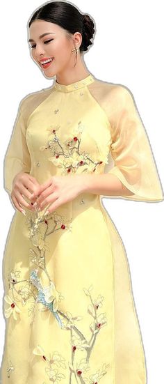 Elegant Embroidered Cheongsam For Spring, Spring Floral Embellished Fitted Gown, Spring Floral Embroidered Fitted Gown, Spring Banquet Gown With Floral Applique, Elegant Spring Ceremony Gown, Elegant Ao Dai With Floral Embroidery For Spring, Elegant Embroidered Ao Dai For Summer, Floral Embroidered Organza Gown For Spring, Spring Organza Gown With Floral Embroidery