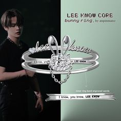 a woman holding onto a ring with the words lee know core on it and an arrow