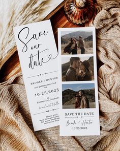 save the date cards are laying on top of a furnishing blanket and some other items