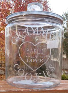 a glass jar that has some writing on it