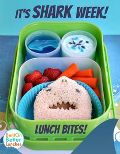 a lunch box with food in it and the words, it's shark week