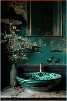 a bathroom sink sitting under a mirror next to a green wall