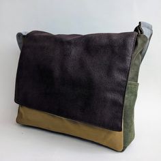 "Camel Brown Large Vegan Messenger Bag, Durable Canvas Laptop Bags, Crossbody / Shoulder Bag for Men, Gift for Him A classic unisex messenger bag, made from a mix of fabrics, textures, and colors that create a wide variety of unique pieces available. This bag perfect for university and college students, as well as for work. It is large and convenient to accommodate large laptops, books, and folders (and your lunch too...). You can Customize this bag in any color you wish! write to us about which colors you want in your personalized Bag!  ** SPECIFICATIONS ** Features: + Color - Coffee Brown -  + Wide adjustable shoulder strap to fit any height. + 2 internal compartments for comfortable use. + 2 internal pockets that close with a Velcro snap. + Middle internal pocket will fit up to 15\" lap Brown Flap Shoulder Bag For Everyday Use, Brown Waxed Canvas Briefcase, Brown Waxed Canvas Rectangular Briefcase, Rectangular Waxed Canvas Briefcase, Outdoor Rectangular Shoulder Bag, Brown Shoulder Bag With Removable Pouch For Everyday, Khaki Shoulder Bag For Everyday Use, Everyday Use Brown Flap Bag, Modern Rectangular Bag With Waxed Finish