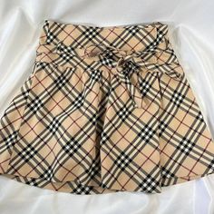 Iconic And Authentic Burberry Nova Check Mini Skirt Channel Your Y2k Paris Hilton Rich Bitch Vibes With This Burberry Skirt. The Skirt Is A 36 Which Is Equivalent To A S This Skirt Would Fit A 2-6 Size Would Say. Even Bigger Due To The Format Being Wrap In Great Condition Very High Quality And Highly Sought After, Originally Purchased For 750 Y2k Paris Hilton, Burberry Skirt, Check Mini Skirt, Paris Hilton, Mini Skirt, Burberry, Womens Skirt, Mini Skirts, Skirt