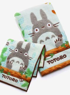 two towels that have totoro on them