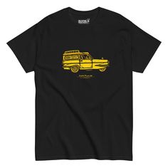 a black t - shirt with a yellow bus on it