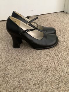 This nice vintage 90s Y2K Unlisted black ankle strap pump heel shoes comes to you in a size 6-6.5. As you can see from the pictures of heels- gently worn n loved. Pls compare the measurements I give you to those in your closet. Mary Janes With 4-inch Heel And Round Toe, Retro Black Mary Janes With Block Heel, Black Mary Jane Block Heels With Sculpted Heel, Black Mary Janes With Padded High Heel, Retro High Heels With Heel Strap, Retro High Heel With Heel Strap, Retro Round Toe Mary Janes For Evening, Retro Heels With Heel Strap And High Heel, Black Mary Janes With Stacked Heel And Round Toe