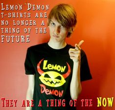 a young man wearing a t - shirt that reads lemon demon, no longer a thing of the future