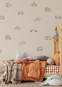 a child's bedroom with cars and trucks wall decals