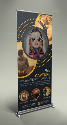 a roll up banner with an image of a woman wearing sunglasses and holding a cell phone