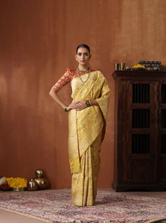 Adorn yourself in Khinkhwab's Shikargah Katan Silk saree, a fusion of luxurious Katan silk and intricate Shikargah motifs. This opulent creation is a statement of elegance, blending tradition and sophistication seamlessly. Embrace the allure of heritage with every thread, making this saree a timeless celebration of beauty. The Shikargah saree from Khinkhwab is not just a garment; it's a celebration of heritage and timeless beauty. Transitional Meenakari Paithani Silk Pre-draped Saree, Pre-draped Meenakari Paithani Silk Saree For Transitional Season, Transitional Raw Silk Pre-draped Saree For Traditional Ceremonies, Elegant Meenakari Paithani Silk Pre-draped Saree, Wedding Meenakari Tussar Silk Pre-draped Saree, Ceremonial Gold Tussar Silk Traditional Wear, Raw Silk Traditional Wear With Meenakari For Puja, Silk Blouse Piece With Meenakari And Traditional Drape, Art Silk Pre-draped Saree With Meenakari