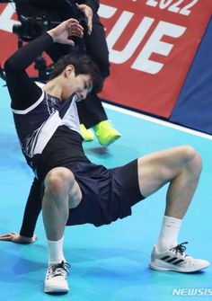 a tennis player in action on the court with his foot stretched out and feet bent forward