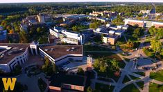 an aerial view of the campus and surrounding buildings