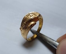 Beautiful handmade Pure Gold handmade Engraved ring by one of our most professional Artist, its and Handmade Artisian so Don't be worry about quality and finish we will take care of it for you. Pure 21k Gold Ring for wedding or engagement also useful for Anniversary Occasions Best Ring for ladies on their beautiful Occasions we care about Flawless Ring Pure gold, Hard shine great polishing would be done by our team mates We can make sizes as per buyer choice Shipping through FedEx as soon as we 22k Gold Engraved Rings For Ceremonial Occasions, Engraved 22k Gold Rings For Ceremonial Occasions, Gold Engraved Ring With Intricate Design For Marriage, Ceremonial 22k Gold Engraved Rings, Traditional Yellow Gold Engraved Ring For Marriage, Handmade Engraved Yellow Gold Wedding Ring, Artisan Engraved Ring For Wedding, Handmade Engraved Oval Ring For Weddings, Traditional Marriage Rings With Intricate Design