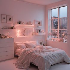 a bedroom with pink walls and white bedding in front of a large window overlooking the city