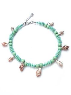 This ankle chain is handcrafted with wooden beads, seed beads, sequins with shell beads. The anklet is available in the colours orange, sea green, blue and pink. The ankle bracelet closes with a silver-coloured lobster claw clasp. Length anklet 10.6 - 12.2 inches (27-31 cm). All jewelry are handmade and designed in a limited edition. This creates an ever-changing collection that effortlessly respond to the latest fashion trends. The prices include shipping (in the Netherlands) and gift wrapping. Do you want the jewelry shown in a different color or length or have any other questions, please feel free to contact me. www.perelle.nl  www.facebook.com/perelle.nl Ocean-inspired Beaded Anklets For Summer, Summer Ocean-inspired Beaded Anklets, Beaded Shell Anklets For Beach, Adjustable Beaded Bracelets With Dangling Beads For Beach, Shell Necklace With Wooden Beads For Beach, Wooden Beads Shell Necklace For Beach, Beach Shell Necklace With Round Wooden Beads, Bohemian Anklets With Round Beads For Beach Season, Handmade Shell Strand Anklets