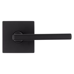 a black door handle on a white wall