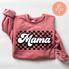 If you're looking for a thoughtful and practical gift, our apparel is sure to be appreciated by anyone who receives it. These retro mama sweatshirts are handmade to order on an ultra-soft crewneck that will quickly become your go-to apparel item! Our trendy checkered mama hoodies are made with eco-friendly water-based ink that feels good and lasts longer! You will never want to take it off! ♥Sizing info♥ *Unisex sizing. *Order your true size for a more fitted feel. Size up for a slouchier look ♥ Mama Hoodie Ideas, Crew Neck Cotton Hoodie For Mother's Day, Crew Neck Cotton Hoodie, Long Sleeve Sweatshirt With Lettering As Gift, Cotton Sweatshirt With Lettering For Gift, Fall Letter Print Hoodie As Gift, Fall Letter Print Hoodie Gift, Mother's Day Casual Sweatshirt With Custom Print, Custom Print Sweatshirt For Fall Gift