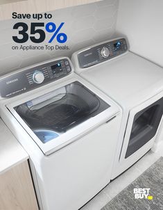 a white washer and dryer sitting next to each other