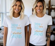 two women wearing white t - shirts that say sisters and never such devoted to sisters