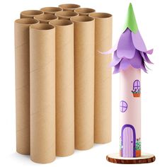 a group of cardboard tubes with a purple flower on top