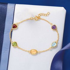 Ross-Simons - 5.50ct t. w. Multi-Gemstone Station Bracelet Over Sterling. 7". Wear a rainbow on your wrist with this 5.50 ct. t. w. multi-gemstone station bracelet. It appeals to the eye and calls to the heart with its stream of citrine, amethyst, peridot, blue topaz and garnet gemstones in varying shapes on an 18kt yellow gold over sterling silver cable chain. Includes a 1" extender. Springring clasp, multi-gemstone station bracelet. Fine Jewelry Multi-stone Bracelet As Gift, Multi-stone Round Gold Bracelet As Gift, Gold Multi-stone Bracelet As Gift, Yellow Gold Multi-stone Bracelet Gift, Fine Jewelry Multi-stone Bracelets For Gifts, Round Multi-stone Gold Bracelet As Gift, Multicolor Multi-stone Gold Bracelet As Gift, Elegant Multi-stone Gold Bracelet Gift, Elegant Multicolor Birthstone Bracelets