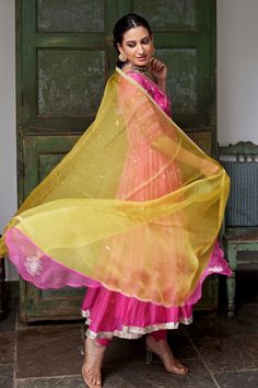 Magenta hand embroidered anarkali with gota and resham dori embroidery. Paired with golden yellow organza dupatta and magenta lycra churidar.
Component: 3
Embroidered
Neckline: V-Neck
Sleeve Length: Elbow
Fabric: Anarkali: Chanderi; Churidar: Lycra; Dupatta: Organza
Color: Pink
Deep back V-Neck
Hand embroidered with gota dori in floral jaal, resham dori and sequins in aztec pattern - Aza Fashions Anarkali Sharara With Resham Embroidery In Chanderi, Navratri Tissue Silk Anarkali Set With Zari Work, Floor-length Tissue Silk Salwar Kameez With Dupatta, Festive Floor-length Chanderi Dupatta, Designer Tissue Silk Anarkali Set With Cutdana, Designer Anarkali Set With Cutdana In Tissue Silk, Unstitched Tissue Silk Anarkali Set With Cutdana, Unstitched Anarkali Sharara With Sheer Dupatta, Transitional Anarkali Set With Sheer Dupatta In Organza