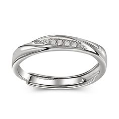 a white gold ring with three diamonds on the top and bottom, set in two bands