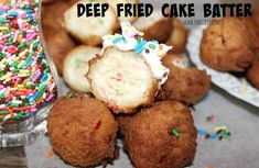 some fried cake batter balls with sprinkles on them