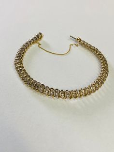 "This is an elegant 14K yellow gold and diamond tennis bracelet. Material(s): 14K yellow gold + (60) diamonds 0.03 points each (Total diamond weight: 2 carats) Weight: 21.1 grams Flaws (if any): None to mention Marking(s): \"14K\" Inside of bracelet measures 7 inches and 5.3 millimeters. If you have any questions about this diamond tennis bracelet, please do not hesitate to contact us! ♥" Yellow Gold Bangle, Diamond Tennis Bracelet, Wedding Jewelry Bracelets, Star Bracelet, Gold Bangle Bracelet, Tennis Bracelet Diamond, Wedding Bracelet, 2 Carat, Tennis Bracelet