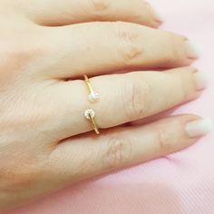 - 14K Real Solid Yellow Gold Open Ring with White Zirconia Stones Simple Dainty For Women is made with high quality 14K real solid yellow gold. - This cute, charm, dainty, delicate, elegant and trendy 14K Gold Open Cuff Ring has been decorated with white zirconia stones. - You receive open cuff ring in a beautiful and free gift box - Free shipping (Arrive within 5 business days to the USA and Canada ( 2 day for production + 3 days for shipment)) - This 14K Solid Gold Open Cuff Gold Ring is a per Gold Open Ring Midi With Single Diamond, Adjustable Yellow Gold Midi Rings With Diamonds, Adjustable Yellow Gold Open Diamond Ring, Adjustable Open Ring In Yellow Gold, Adjustable Open Yellow Gold Diamond Ring, Adjustable Gold Diamond Ring With Simple Design, Yellow Gold Bangle Stackable Rings For Gift, Yellow Gold Stackable Bangle Rings As Gift, Adjustable Diamond Midi Rings As Gift