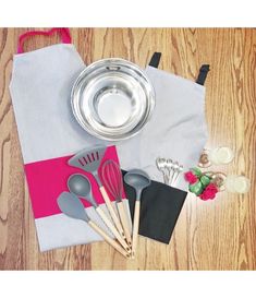 the kitchen utensils are on the table ready to be used in the cookout