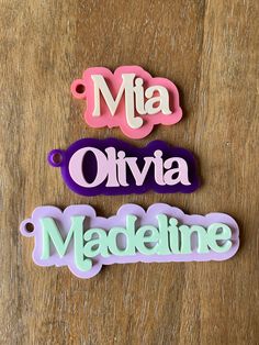 "Over 30 colors to choose from!! This listing is for a single bag tag/keychain. Perfect for backpacks, diaper bags and more!  Includes keychain cable. Keychain is cut from 1/8\" layers of acrylic and layered together. Font is retro style as shown in photos. Each keychain varies in length depending on name. Each is about 2-4\" long. See drop down menu for colors available for backing layer and name.  Please leave single name in personalization box." Customized Pink Keychains, Custom Name Pink Keychains For School, Playful Pink Keychains For School, Personalized Pink Keychains For Personal Use, White Custom Name Keychains For Personalized Gift, Personalized Fun Keychains, White Custom Name Keychain For Personalized Gift, Customizable Cute School Keychains, Cute Customized Keychains For Personalized Gift