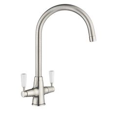 a kitchen faucet with two glass holders on the side and an angled spout