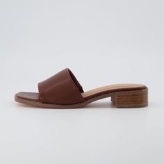 Meet Sage, a low block heel slide sandal. With a premium soft vegan leather upper, these stylish sandals feature a slip-on design for easy on/off and memory foam padding for extra comfort. Plus, Sage's 2-inch block heel completes the look. Graduation Sandals, Building Wardrobe, Womens Leather Sandals, Church Shoes, 2024 Shoes, Shoes For Work, Low Block Heel Sandal, Summer Shoes Sandals, Cozy Boots