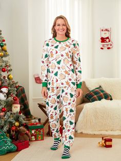 Coordinating family sleepwear in fun Christmas cookie pattern.
* Please add each size separately to your shopping cart
* Each size includes 1 set (1 top and 1 pant), or 1 jumpsuit or 1 pet bandana.
* For children's safety, pajamas should be snug-fitting or flame-resistant. These kids' and babies' pajamas are flame-resistant. 
* Festive Christmas cookie pattern
* Polyester and spandex blend for comfort
* Long sleeves and round neckline
* Casual style suitable for all occasions
* Suitable for wint Matching Christmas Pajama, Matching Pajama Set, Holiday Traditions Family, Comfy Blouse, Matching Pajama, Matching Christmas Pajamas, Family Holiday Photos, Christmas Pajama Set, Matching Sweaters