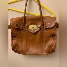 Mulberry Brown Leather Bag. Gold Tone Hardware, Double Rolled Handles, Turn-Lock Closure, Interior Large Zippered Pocket As Well As Two Smaller Pockets. Suede Interior, Belted Sides To Adjust Space To Your Liking. Some Minor Natural Leather Wear, And Interior Suede Wear, Minor Hardware Tarnish, See Photos, Otherwise In Great Condition. Vintage Hobo Bag With Gold-tone Hardware, Travel Tote Satchel With Hasp Closure, Vintage Satchel With Removable Pouch For Errands, Everyday Satchel With Brass Hardware And Double Handle, Satchel Shoulder Bag With Brass Hardware For Daily Use, Tote Satchel With Brass Hardware For Shopping, Shopping Satchel Tote With Brass Hardware, Brown Bags With Brass Hardware And Double Handle, Rectangular Hobo Bag With Brass Hardware For Travel