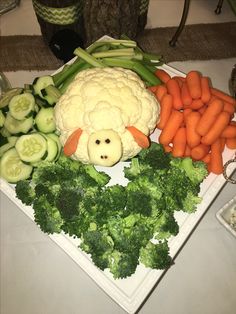 there is a platter with vegetables on the table