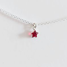 "Pendant measures 5mm. Lovely and tiny red star in 925 Sterling Silver necklace. Please choose your favorite necklace length at checkout. All lengths have a one inch extender, that way you'll have some wiggle room to play with the length. For example, if you choose a 14 inches necklace length, you'll have options to close the necklace at any length between 14 inches and 15 inches.  Some of this charms are sold by themselves (no chain). If that option is available for this, you will have the option to buy \"CHARM ONLY\" before adding the item to the cart. Normally, a 3 mm ring made out of the same material is attached to the charm. If you own a chain and plan to use the charm for it, ensure that the 3 mm ring will pass through, or you have a bigger ring if needed, and/or you know how to ope Turquoise Heart Necklace, Necklace Ruby, Minimal Necklace, Star Pendant Necklace, Turquoise Heart, Necklace Layering, Big Rings, Ruby Necklace, Valentines Necklace