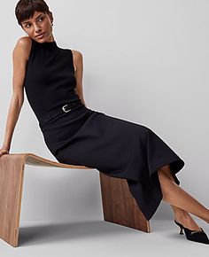 Elevate your wardrobe with the Ann Taylor Ponte Belted Midi Pencil Skirt, a piece that marries sophistication with comfort. This skirt is designed to flatter, featuring a sleek midi length and a streamlined silhouette that enhances your figure.

- Size: Regular - 6
- Color: Black
- Gender: Female
- Material: 66% Rayon, 30% Nylon, 4% Spandex
- Length: 32" long
- Features: Belt loops, self-tie buckle belt, hidden back zipper with hook-and-eye closure, back vent

Perfect for both office and evening